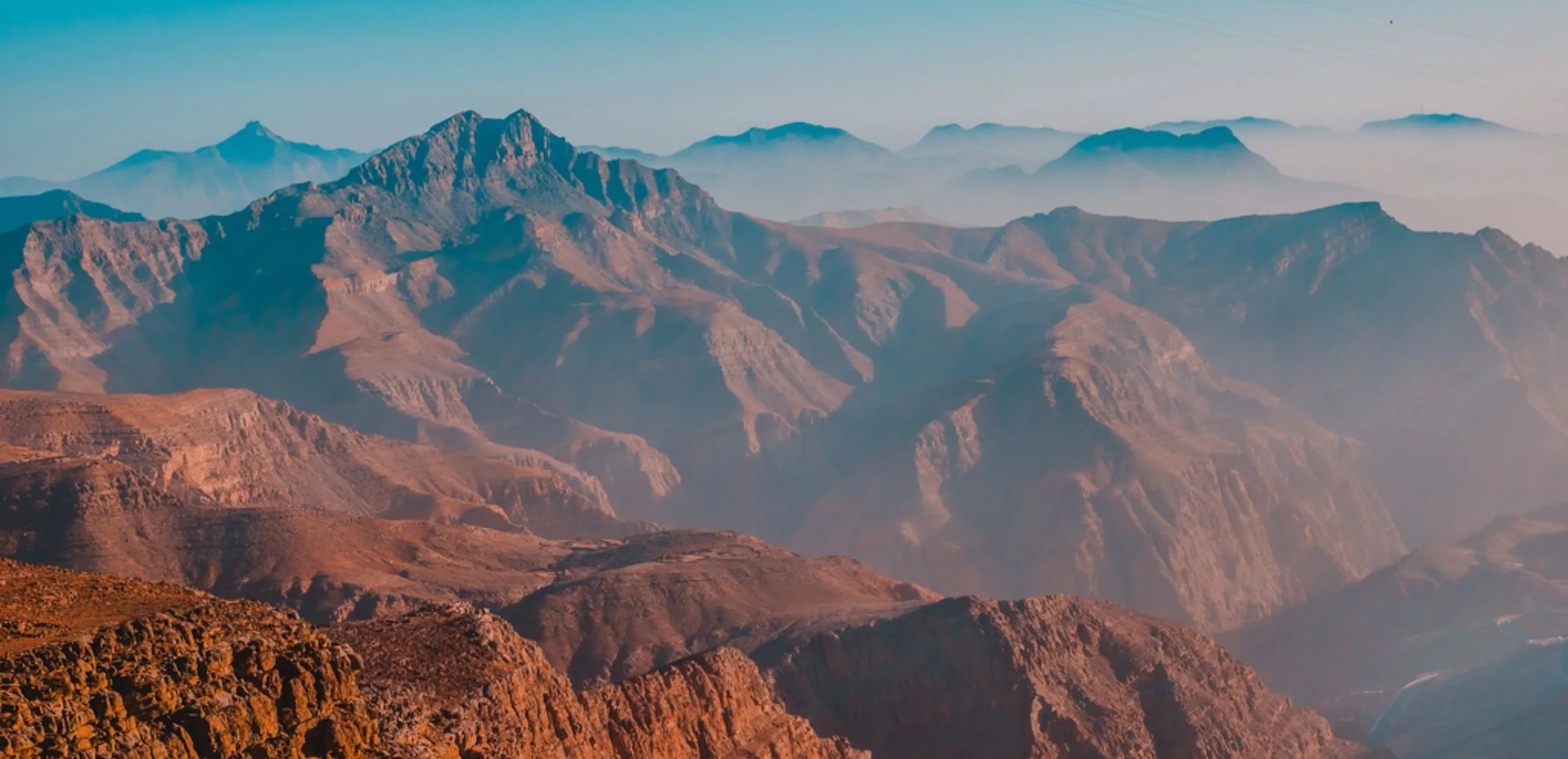 Rugged mountains of Ras Al Khaimah at sunset.